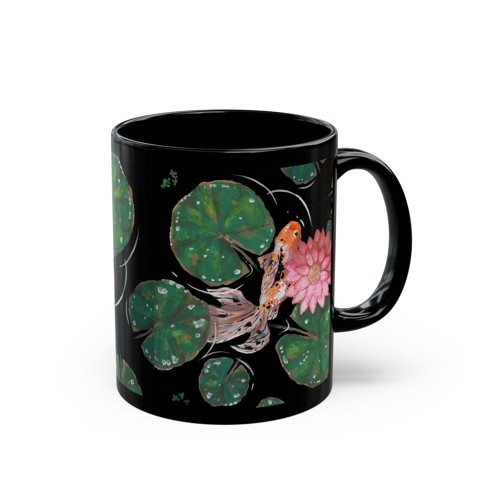 This is the 15 oz Goldfish Mug designed by Chris Foster Design. The image is shown slighty to the right with all around print. There are nine green lily pads of different sizes with water droplets reflected in clear/white. There is another speckled white, orange and black goldfish that can be fully seen swimming under a pink lily flower. The goldfish has three orange/pink tail fins. The water ripples and is clear matching the color of the mug which is black. The mug is ceramic with a glossy finish. 