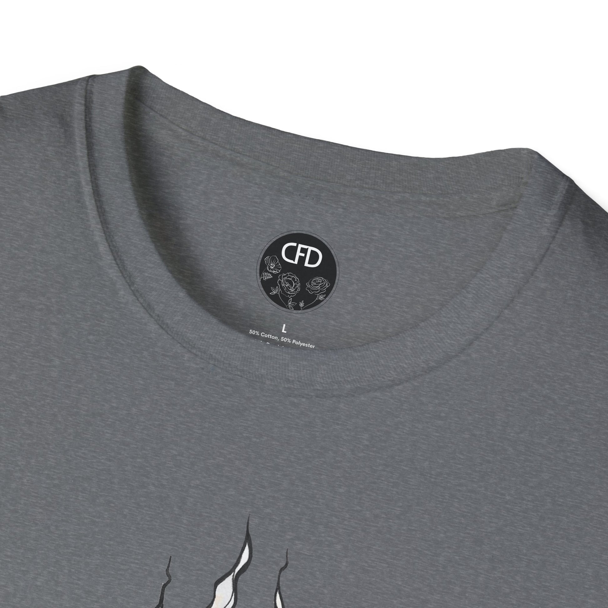 This is the Graphite Heather English Breakfast Tea T-Shirt by Chris Foster Design. It comes in sizes XS-5XL. This is a close up of the front with a circular CFD logo in white lettering and black background. The CFD logo and white flowers surrounding the bottom of the lettering. The size label is below the logo in black. From the closeup a little bit of the illustration is white wisps. The image is against a white background.