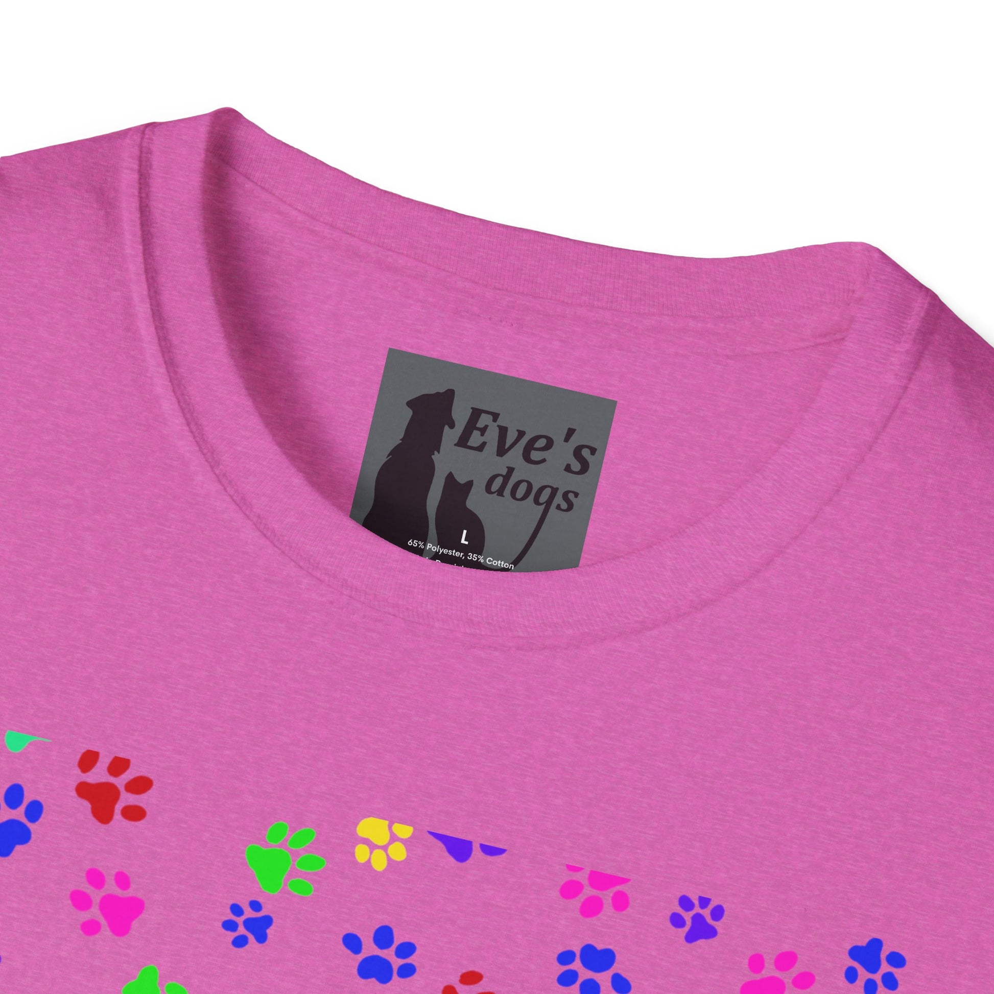 This is the Heather Berry Adopt Eve's Dogs T-Shirt. It comes in XS - 5XL. This is an upclose image of the shirt where the neck/tag is. The size label is a grey and black tag with a dog and cat with the "Eve's dogs" writing. The sizes and shirt product materials are printed in white. There is a little bit of paw prints on the front.  The colors are pink, green, blue, purple, red paw prints in different sizes. It is against a white background.