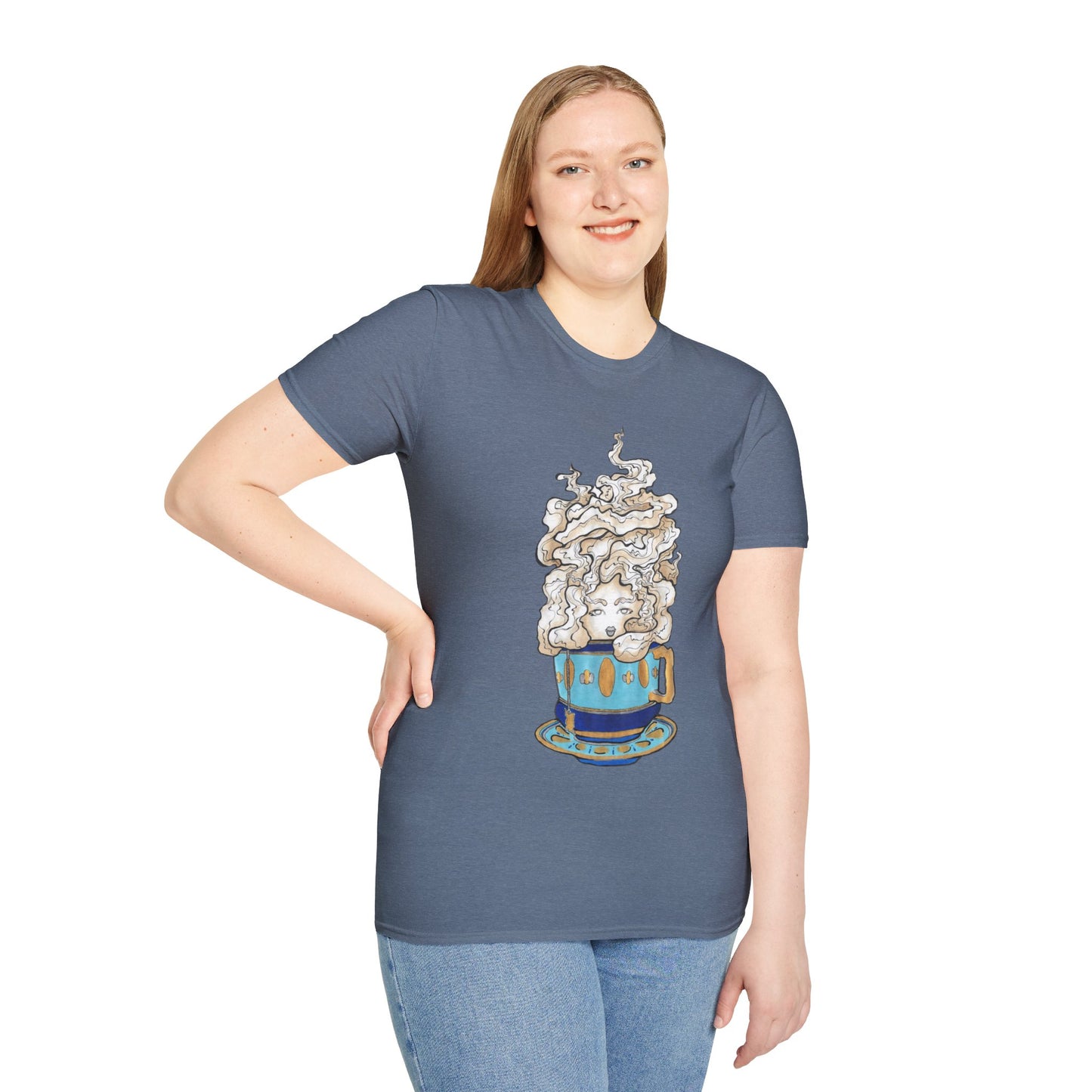 This is the Heather Indigo Grey Earl Grey Softstyle T-Shirt by Chris Foster Design. It comes in sizes XS-5XL. The illustration is of a gold, light blue and dark blue teacup with a tan, yellow and white steam. The steam is swirly and goes up and outwards. In the middle is a lady's face. A smiling lady facing the front with her head tilted slightly to the left, hair behind shoulders, right hand on waist, other hand hanging naturally and is wearing dark jeans and the designed t-shirt. 