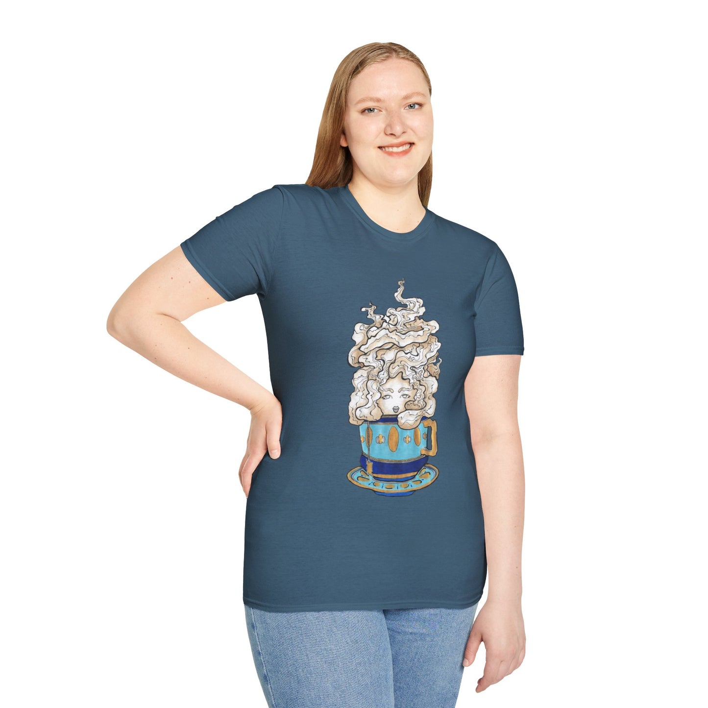 This is the Indigo Blue Grey Earl Grey Softstyle T-Shirt by Chris Foster Design. It comes in sizes XS-5XL. The illustration is of a gold, light blue and dark blue teacup with a tan, yellow and white steam. The steam is swirly and goes up and outwards. In the middle is a lady's face. A smiling lady facing the front with her head tilted slightly to the left, hair behind shoulders, right hand on waist, other hand hanging naturally and is wearing dark jeans and the designed t-shirt. 