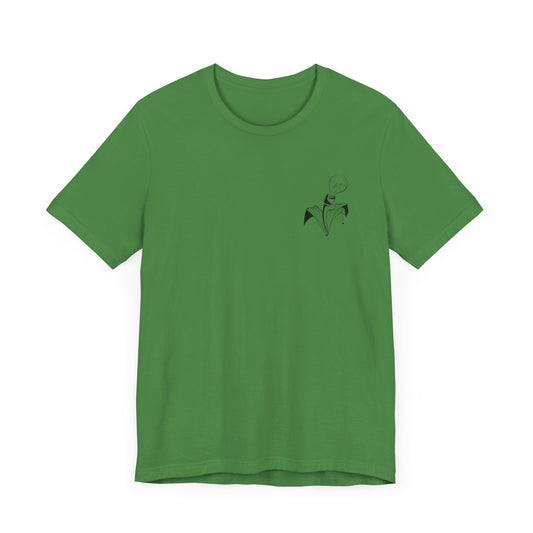 This is the Leaf Frankenstein's Monster T-Shirt by Storm Garden Studio. The T-Shirt comes in sizes S - L. This is the front of the shirt. There is the Storm Garden Studio logo printed in black on the left breast area. The rest is the color of the shirt. It is against a white background.