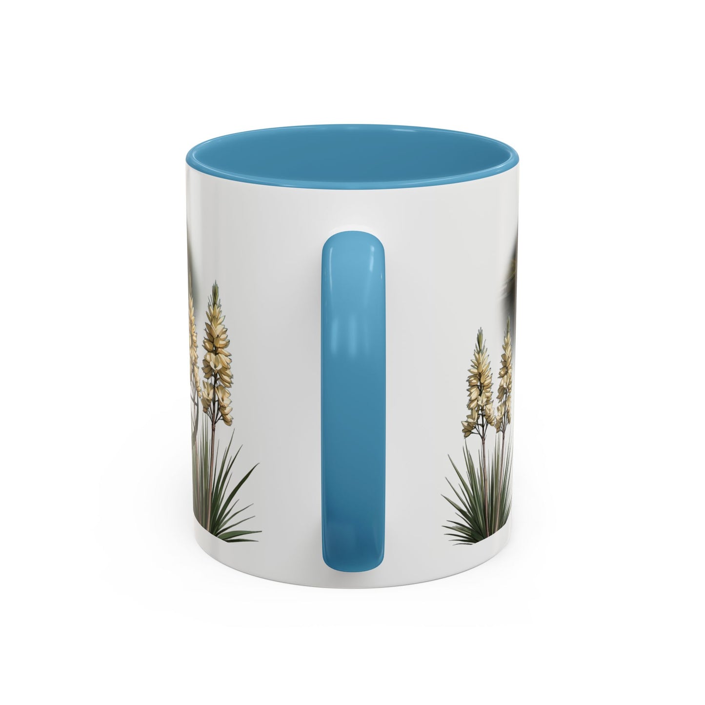 This is the 11oz Light Blue Lake Gaston Mug. It is an illustration by Lee Hansheng Studios. The picture is shown from the handle. The handle and inside of mug is color matched too. There are some American yucca plants shown on the left and right side. The mug is all white except for the illustration and handle.