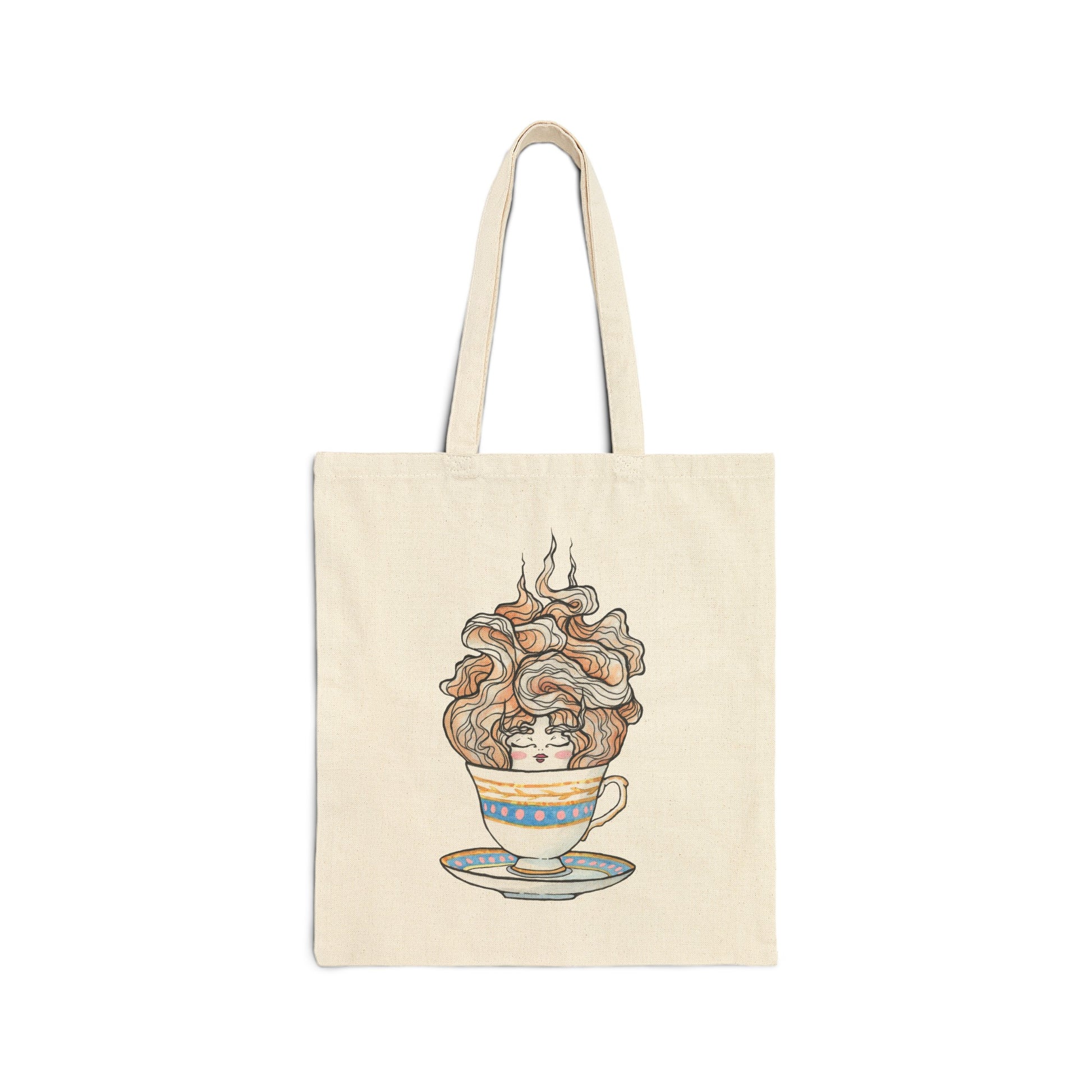 This is the Natural 15" x 16" English Breakfast Tea Canvas Tote Bag by Chris Foster Design. The illustration is a teacup that is light blue, yellow and white with light pink, white and red steam that is going upwards. There is a lady's face in the middle and beginning of the teacup with her eyes closed, red lips, blushing pink cheeks. and eyebrows that go upward. The tote is against a white background.