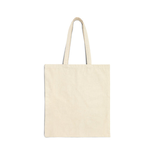 This is the Natural 15" x 16" Miss Amanita Cotton Canvas Tote Bag by Storm Garden Studio. This is the back of the tote and is the color of the tote. There is no illustration on this side. It is an image of the tote against a white background.
