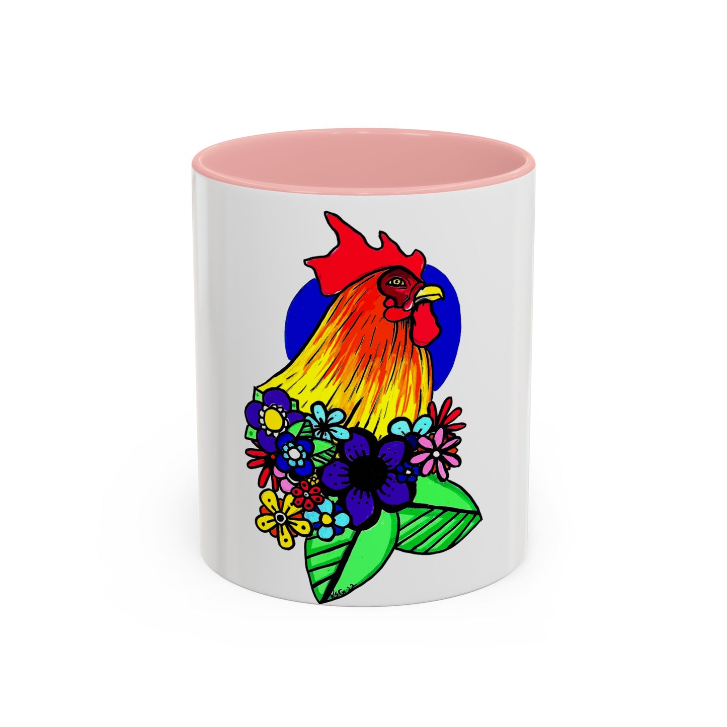 This it the Pink 11 oz Cock Accent Coffee Mug by Storm Garden Studio. This image showcases the front of the mug. The illustration is of a rooster with a dark blue circular background. The rooster is adorned with flowers on the bottom of its neck. It is bright green, dark blue, yellow, orange and pink. The rooster is bright red and fades into yellow. The mug is against a white background. 