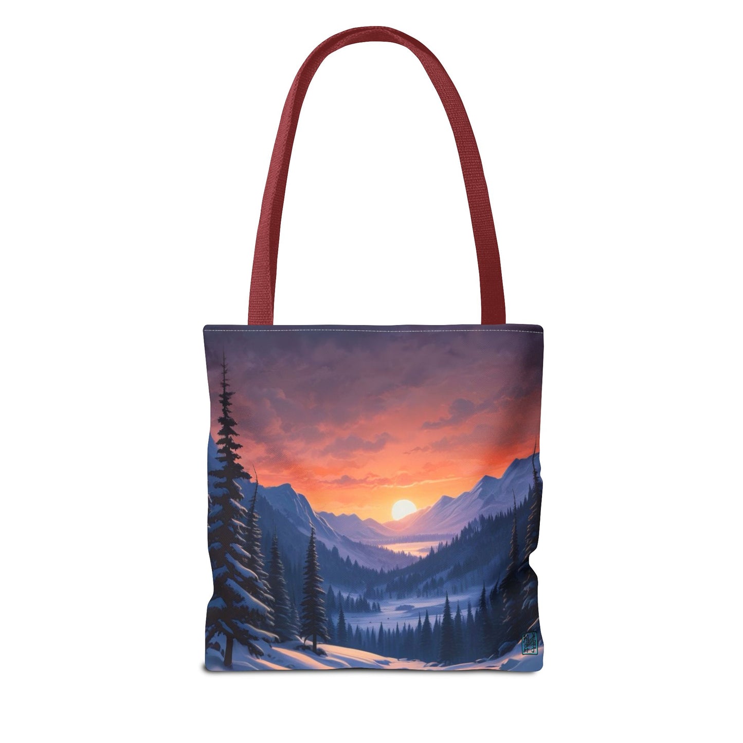 The Red 13" x 13" Snow Valley Tote Bag has color matched handles and all around print. The tote is against a white background.The design by Lee Hansheng Studios showcases a snowy hill/mountain area with large pine trees on both sides continuing into the horizon. The sun rises past the horizon consisting of yellow,orange,red hues illuminating onto wispy clouds,snowy field, mountains and dark green pine trees. 