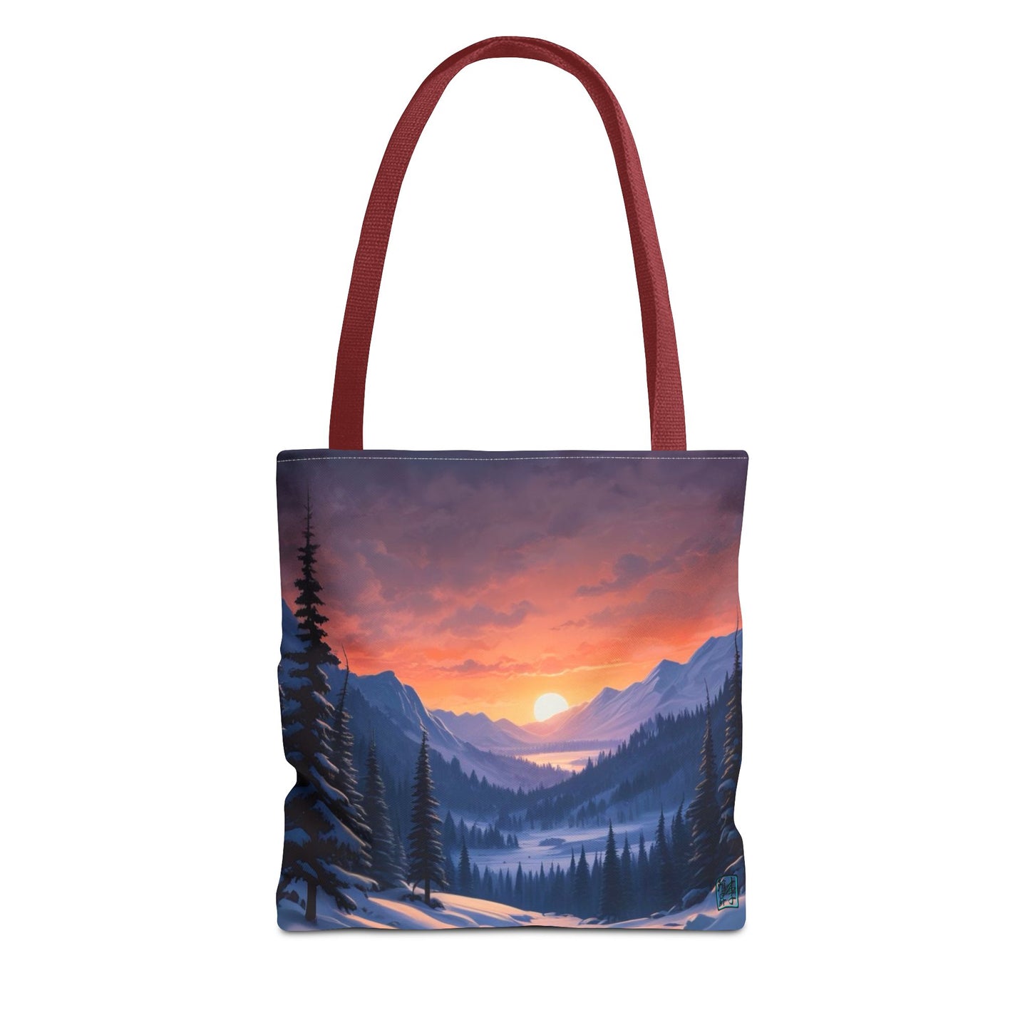 The Red 13" x 13" Snow Valley Tote Bag has color matched handles and all around print. The tote is against a white background.The design by Lee Hansheng Studios showcases a snowy hill/mountain area with large pine trees on both sides continuing into the horizon. The sun rises past the horizon consisting of yellow,orange,red hues illuminating onto wispy clouds,snowy field, mountains and dark green pine trees. 