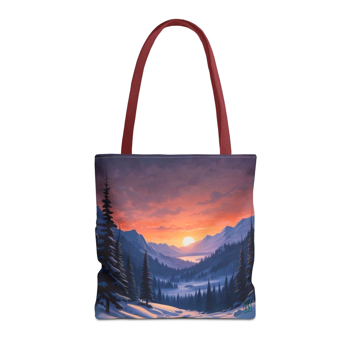 The Red 16" x 16" Snow Valley Tote Bag has color matched handles and all around print. The tote is against a white background.The design by Lee Hansheng Studios showcases a snowy hill/mountain area with large pine trees on both sides continuing into the horizon. The sun rises past the horizon consisting of yellow,orange,red hues illuminating onto wispy clouds,snowy field, mountains and dark green pine trees. 