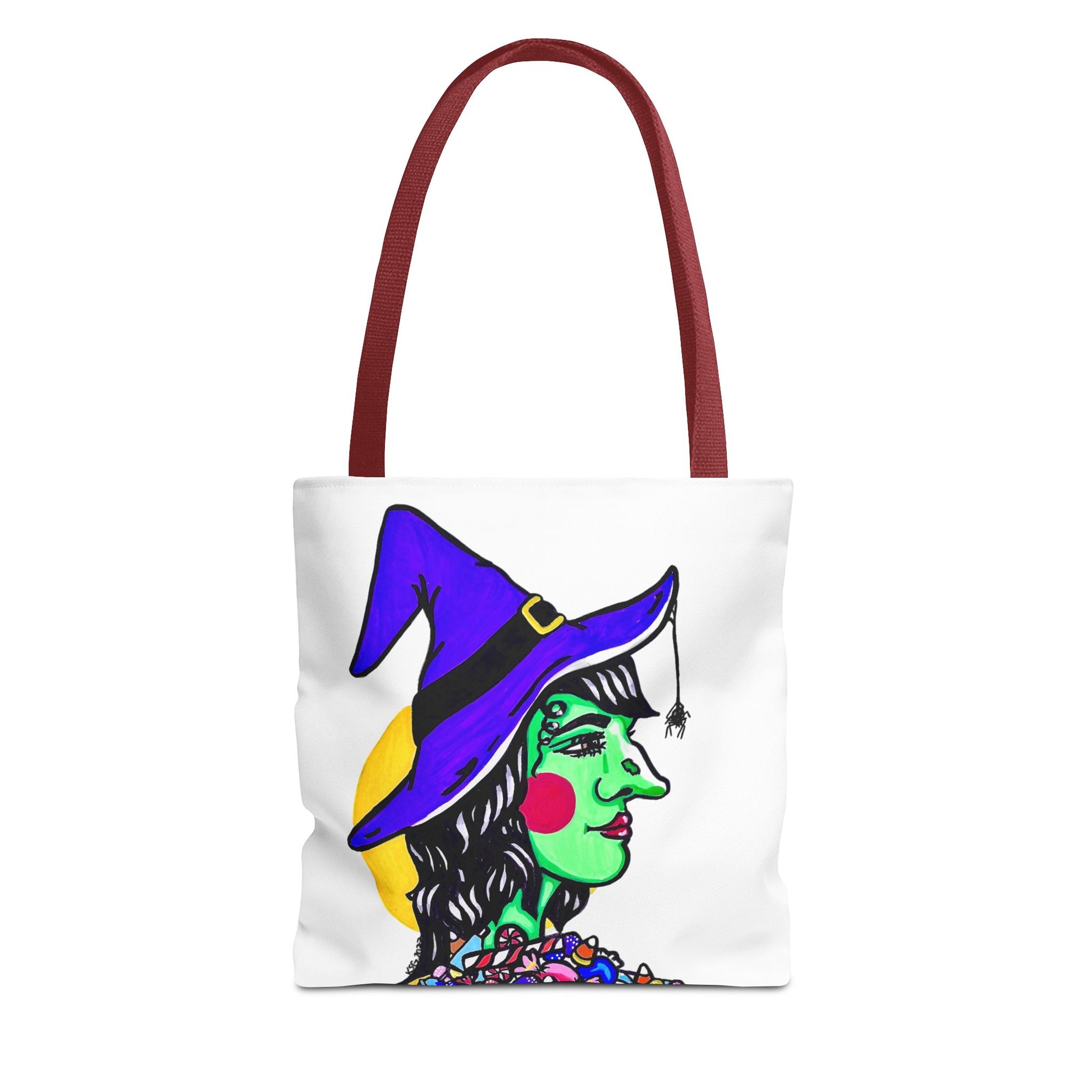 This is the Red 13" x 13" Witch Tote Bag by Storm Garden Studio. The handles are color matched. The tote is all over white except for the illustration. It shows the side profile image of a witch. She is facing the right side. She has a purple witch hat with a black belt, yellow buckle, a spider crawling down the front, red rosy cheeks, red lips and assorted candy under the neck. Behind her is a bright yellow circle past her hair. The tote is against a white background.