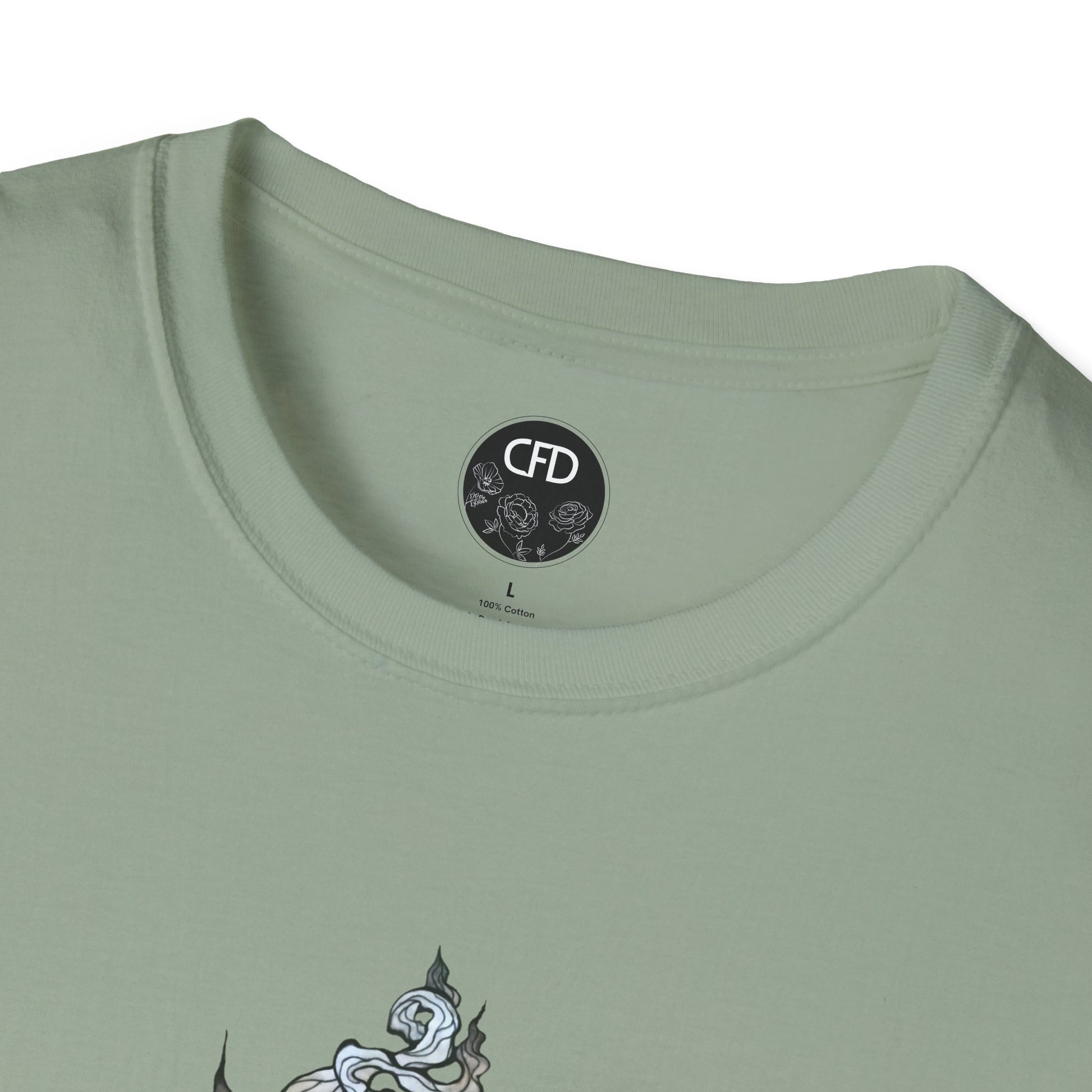 This is the Sage Green Tea T-Shirt by Chris Foster Design.It comes in sizes XS-5XL. This image shows a close up of the front. There is the collar with CFD circular logo with flowers, has a black background and printed in white inside the shirt. The size label is printed in black. Below there is a bit of the illustration, some of the steam of the tea cup is shown in white and light blue. The shirt is against a white background.