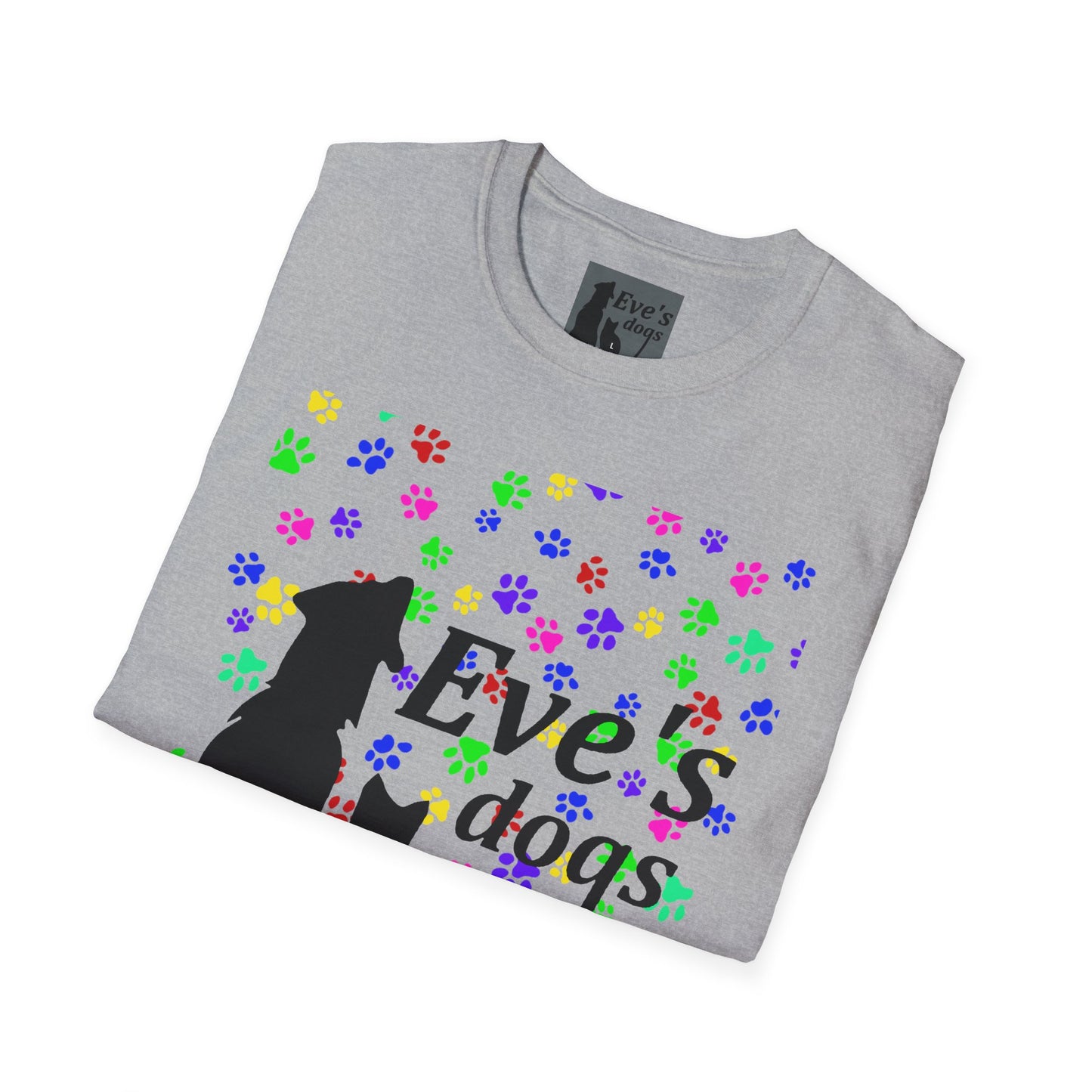 This is the Sport Grey Adopt Eve's Dogs T-Shirt. It comes in XS - 5XL. The image is the shirt folded and showing the front. The size label is a grey and black tag with a dog and cat with the "Eve's dogs" writing. The front has pink, green, blue, purple, red paw prints in different sizes. Also, the dog and cat with "Eve's dogs" printed in black. It is against a white background.