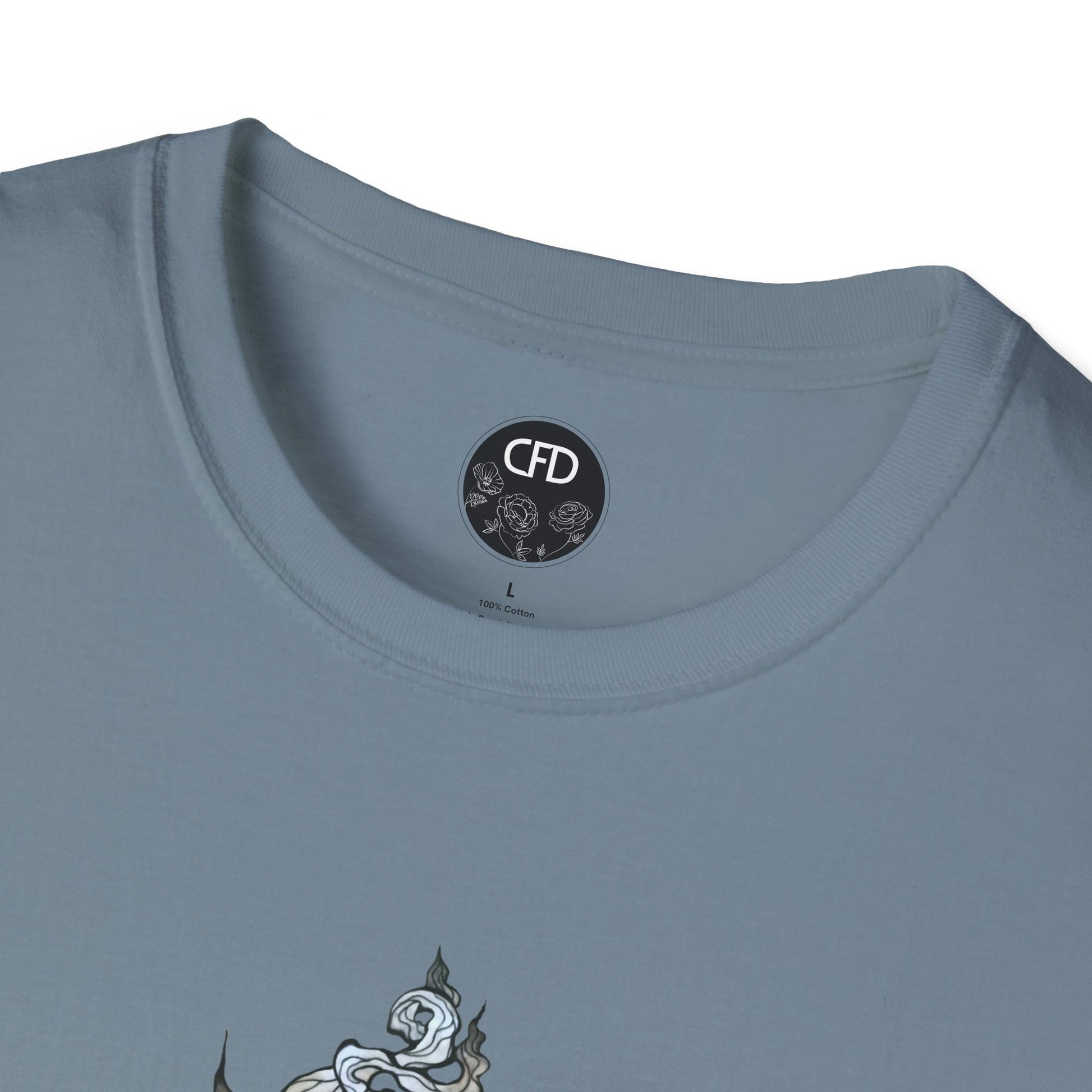 This is the Stone Blue Green Tea T-Shirt by Chris Foster Design.It comes in sizes XS-5XL. This image shows a close up of the front. There is the collar with CFD circular logo with flowers, has a black background and printed in white inside the shirt. The size label is printed in black. Below there is a bit of the illustration, some of the steam of the tea cup is shown in white and light blue. The shirt is against a white background.