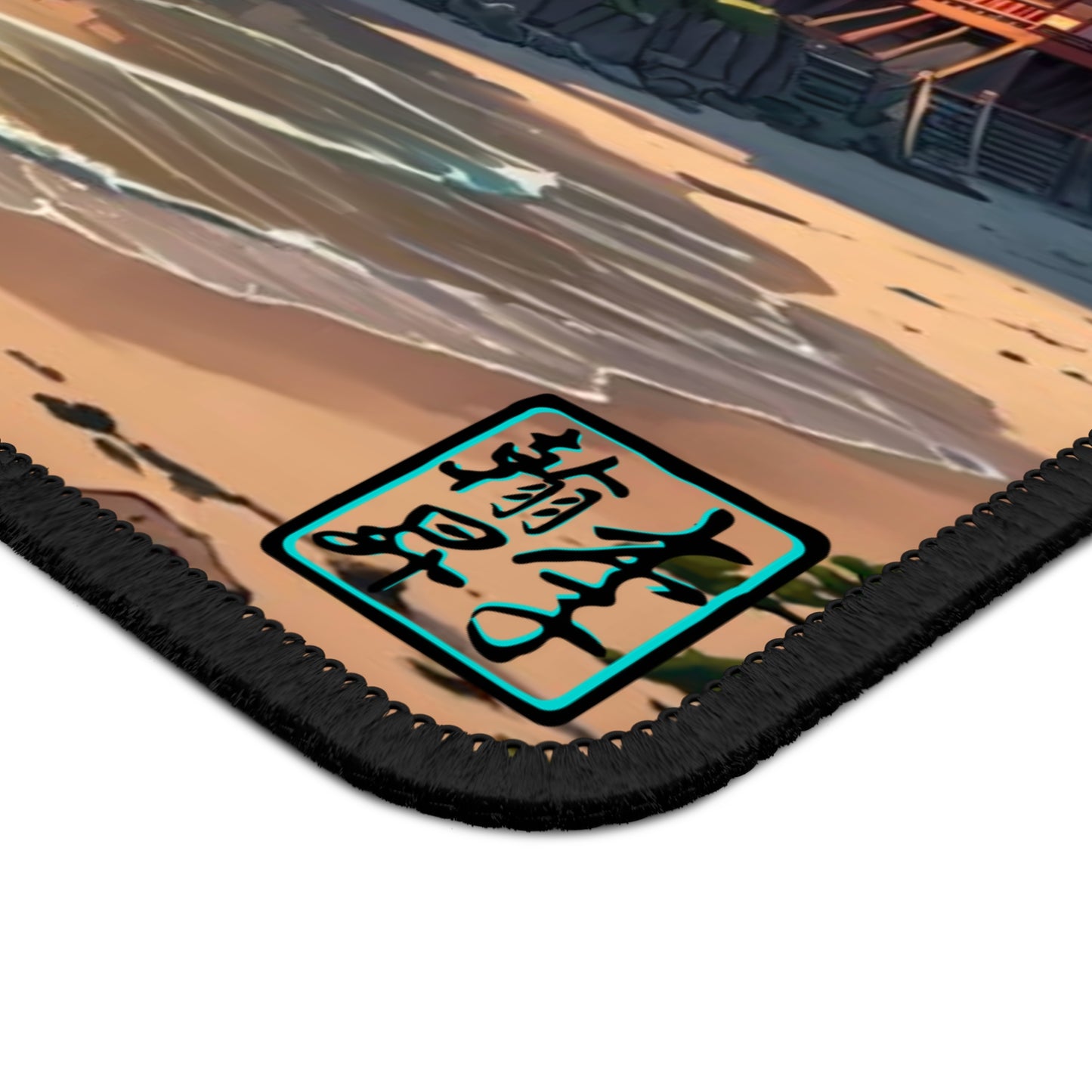 This is the Rectangular 9" x 7" Temple of Peace Mouse Pad by Lee Hansheng Studios. This is a close up image to the bottom right corner. The corner has the logo printed in black for the studio and outlined in blue. Behind the logo is the sandy tan beach and some of the waves rescinding leaving darker water marks. The mouse pad is against a white background.