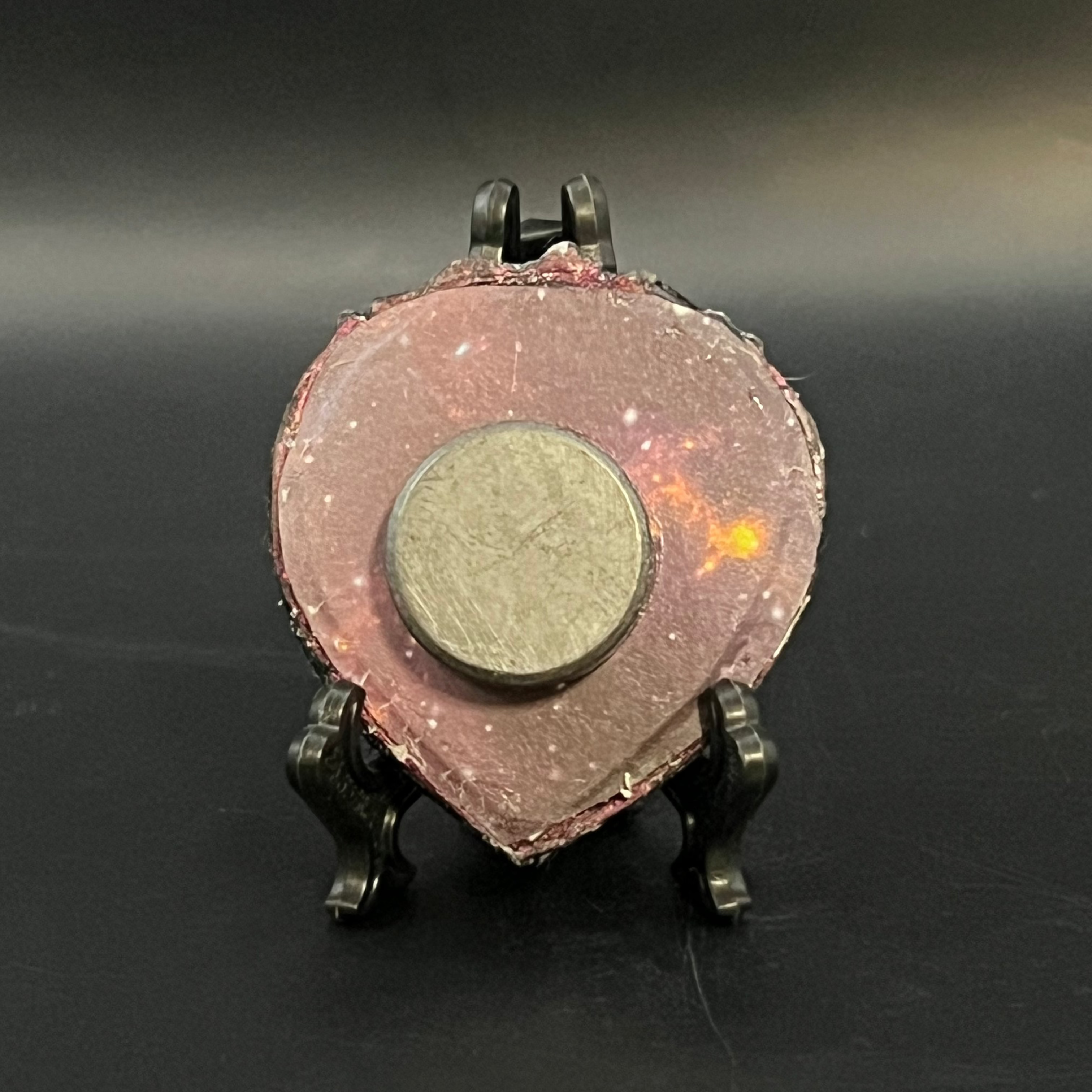 A close-up of the textured brushstrokes and vibrant color transitions highlighting the layered depth of the artwork's pastel