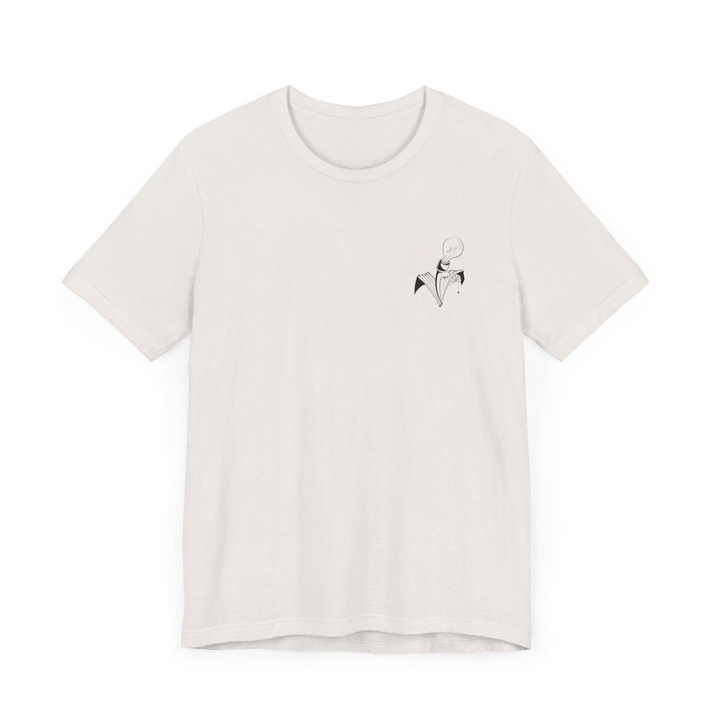 This is the Vintage White Trick or Treat! Witch T-Shirt by Storm Garden Studio. This is the front of the shirt. There is the studio's logo on the left breast pocket area. It is a plant with two leaves, lightbulb for the flower with a spider crawling upon the right printed in black. This shirt is against a white background.