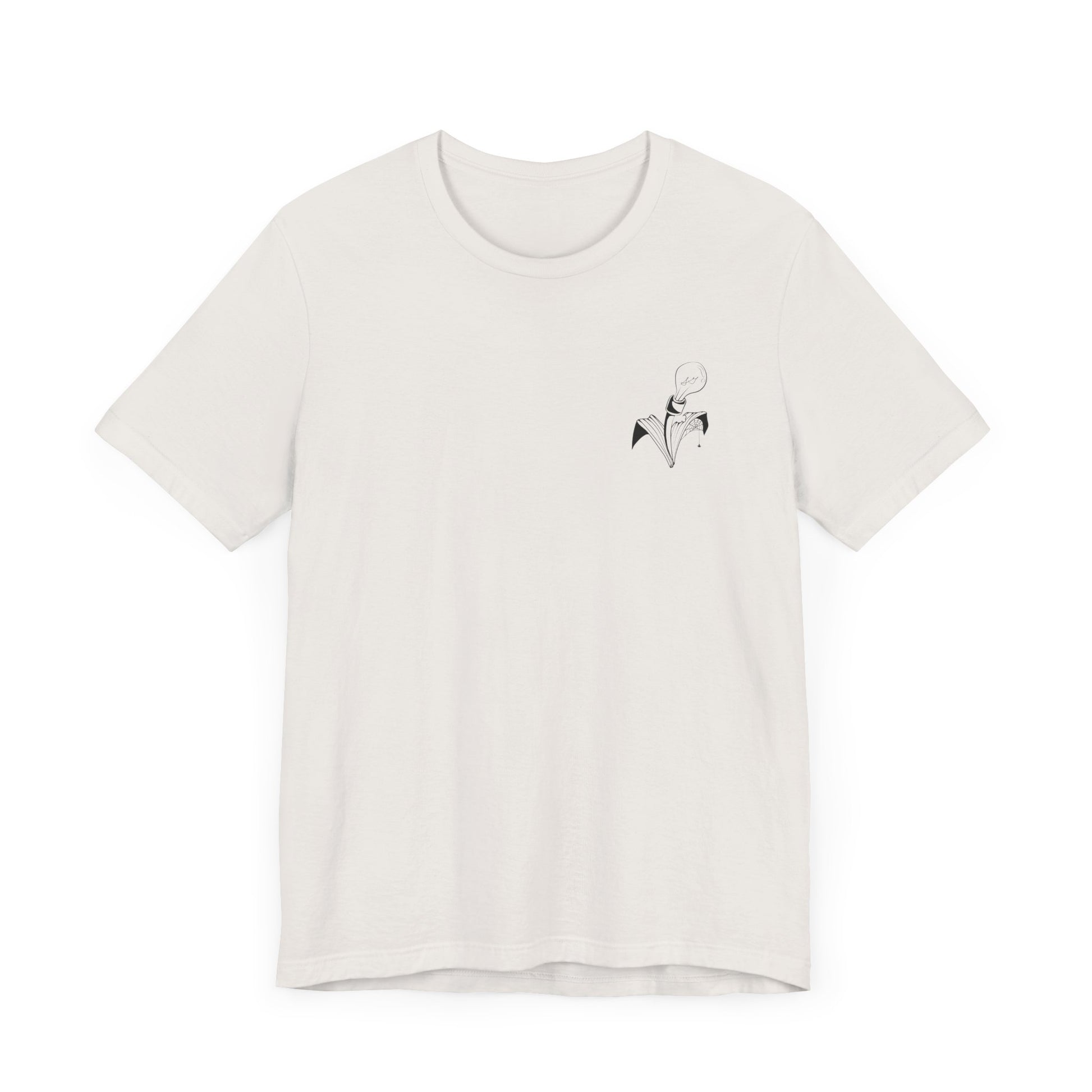 This is the Vintage White Trick or Treat! Witch T-Shirt by Storm Garden Studio. This is the front of the shirt. There is the studio's logo on the left breast pocket area. It is a plant with two leaves, lightbulb for the flower with a spider crawling upon the right printed in black. This shirt is against a white background.
