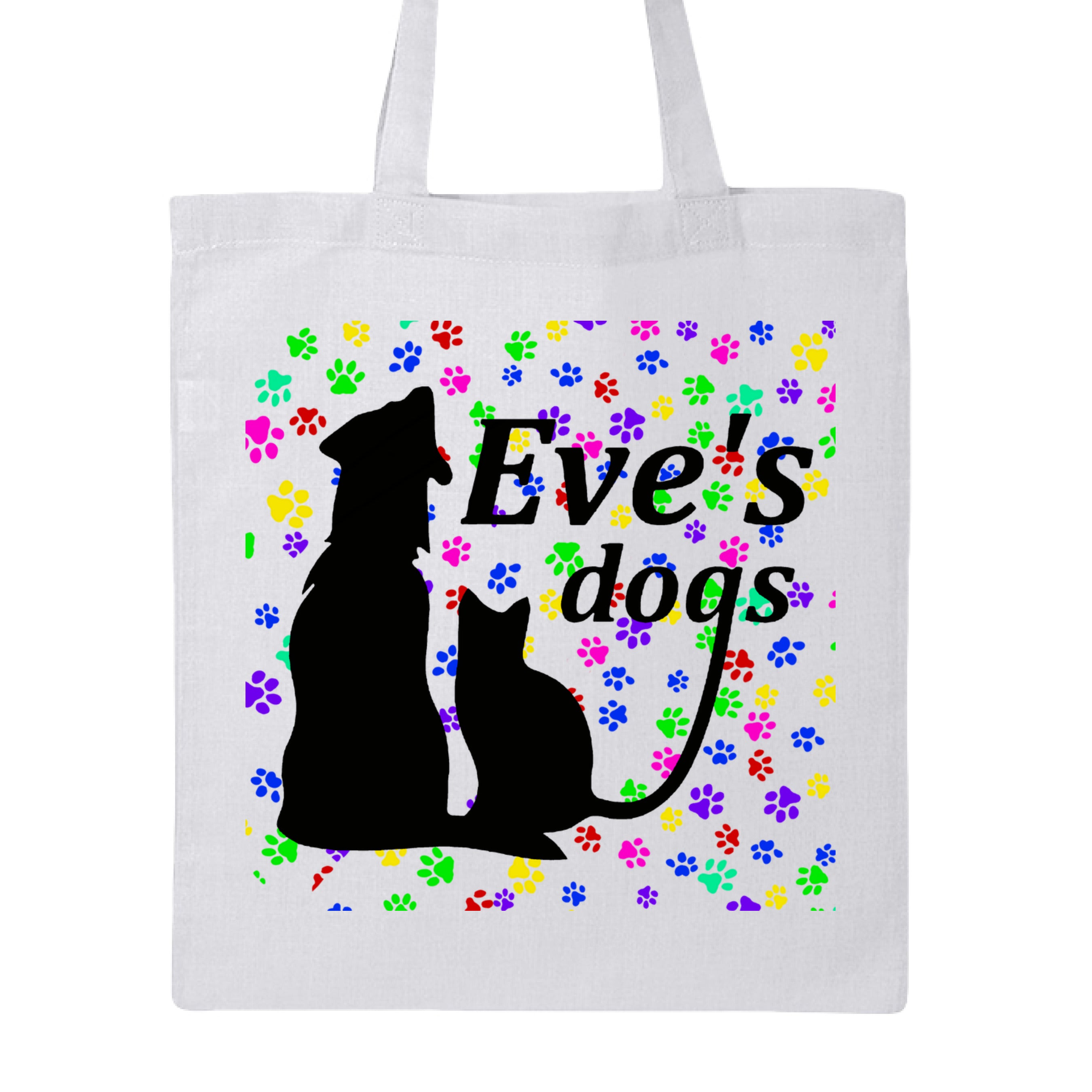 Canvas tote bag with "Paws on Paws" logo, natural cotton fabric, reinforced handles, and dog paw print design by The Art