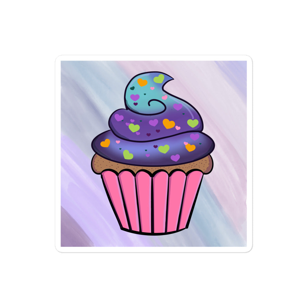 Close-up of a colorful cosmic cupcake sticker featuring vibrant glitter accents and detailed star-shaped designs.