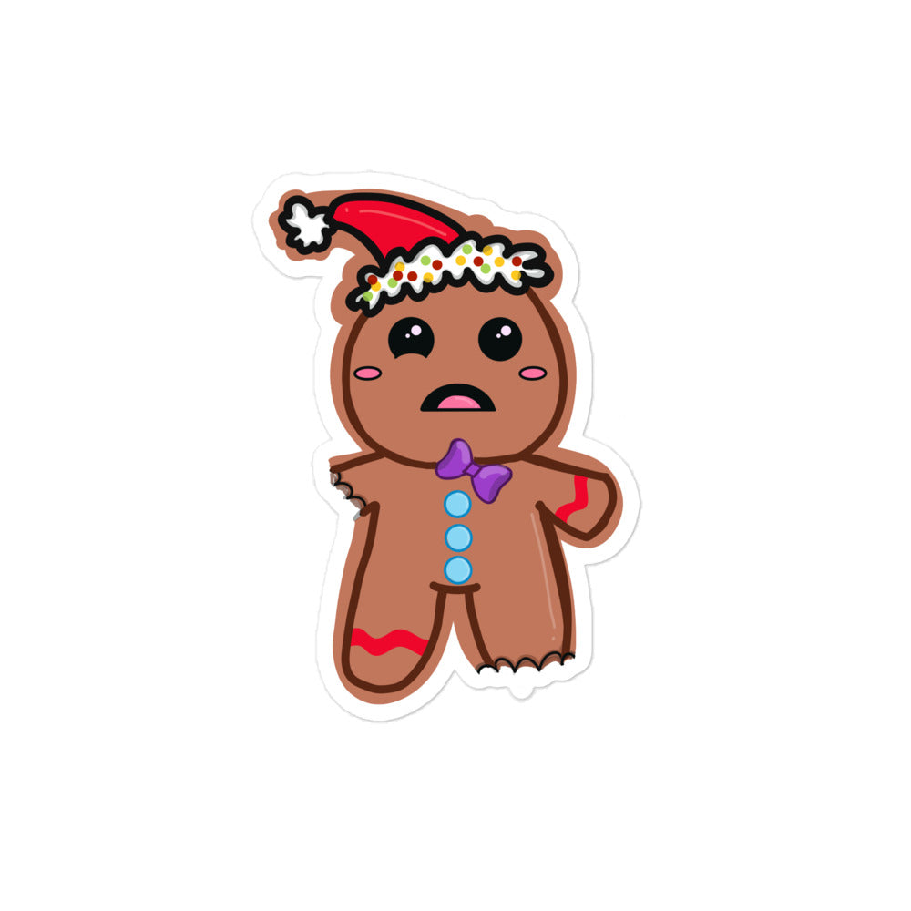 Close-up of the Ginger Dead Man sticker displaying detailed orange frosting textures and black candy eye accents.