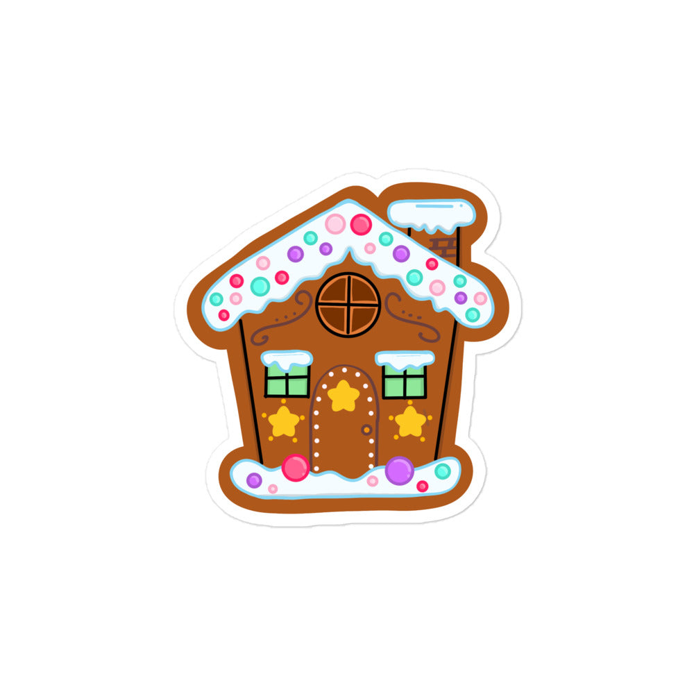 Close-up of the colorful sticker featuring gingerbread house details with textured icing accents and vibrant red, green, and
