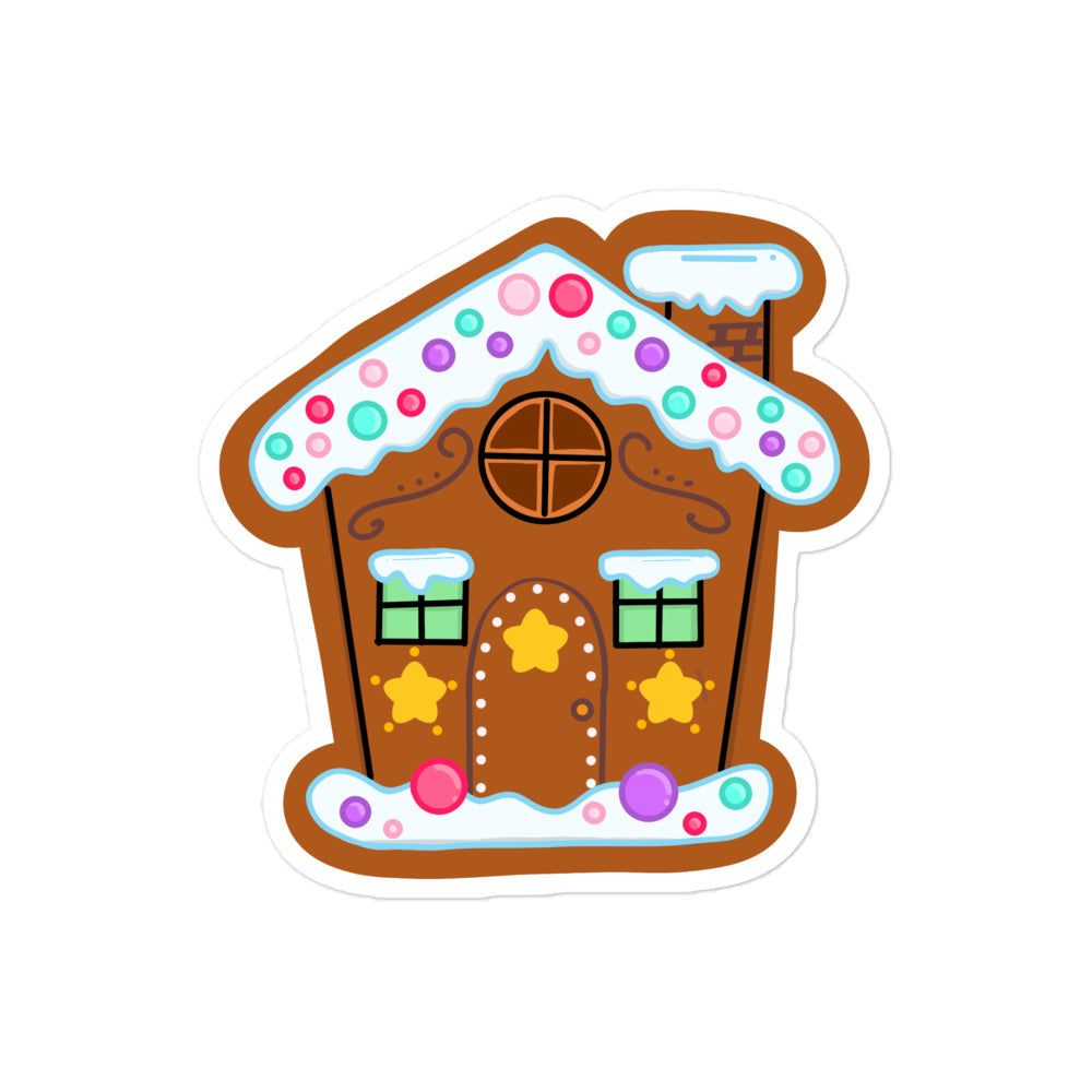 Close-up of the gingerbread house sticker's textured icing details and colorful candy accents on glossy vinyl surface